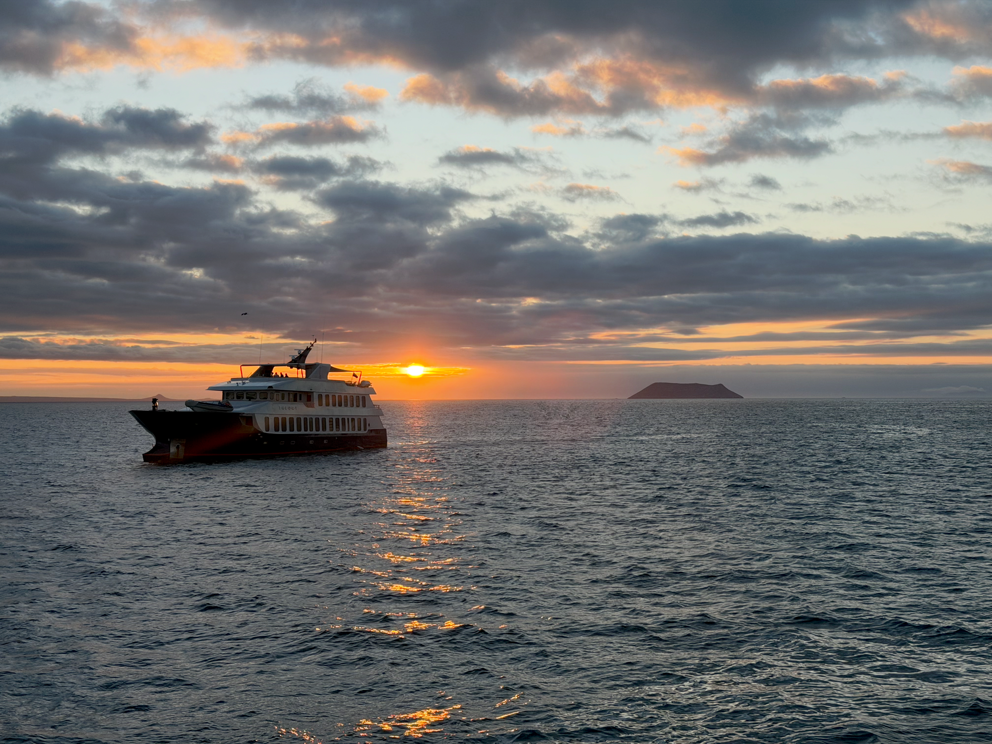 Ecoventura yacht at sunset in the Galapagos.